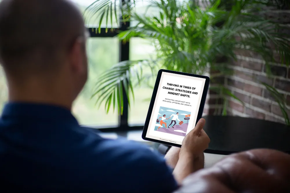 Think Tank Central - Thriving in Times of Change ebook being read by a man in a lounge room